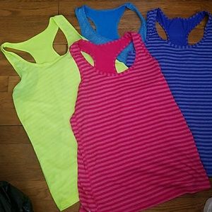 Lot of 4 workout tanks